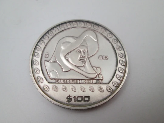 100 pesos United Mexican States coin. Eagle Warrior. Ounce pure sterling silver. 1992