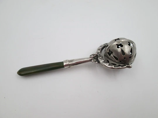 Baby rattle with handle. Sterling silver & bitone resin. Sphere with drops and butterflies