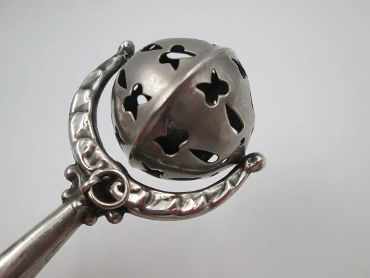 Baby rattle with handle. Sterling silver & bitone resin. Sphere with drops and butterflies