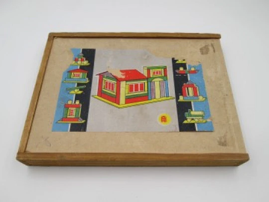 Construction and architecture game with wooden pieces. Original box. 1950's