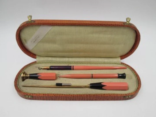 European desk writing set. Pink and purple celluloid. Original case. 1920's