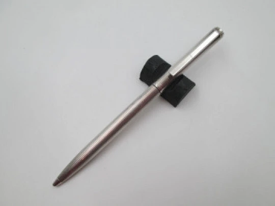 Flaminaire ballpoint pen. Rolled silver. Vertical lines pattern. Twist system. 1970's. Germany