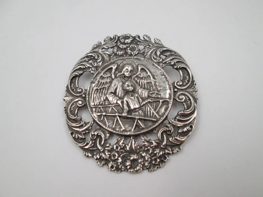 Guardian angel pendant plaque. Sterling silver. Openwork vegetable edge. Spain. 1970's