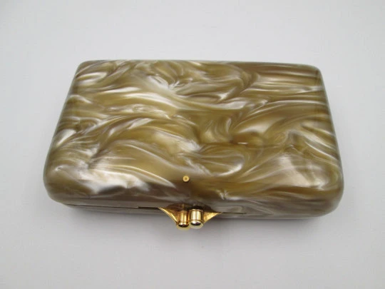 Ladie's vanity handbag. Marble celluloid and gold plated metal. United States. 1950's