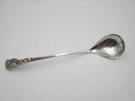 Long serving spoon. 800 sterling silver. Curved handled. Flowers and leaves. 1970's