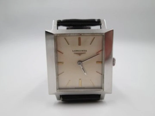 Longines. Stainless steel. 1960's. Manual wind. Rectangular case. Strap