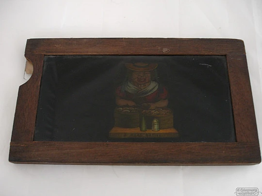 Magic lantern mechanical slide. Single slipping slide. Colonial black slave. Europe. 1890's