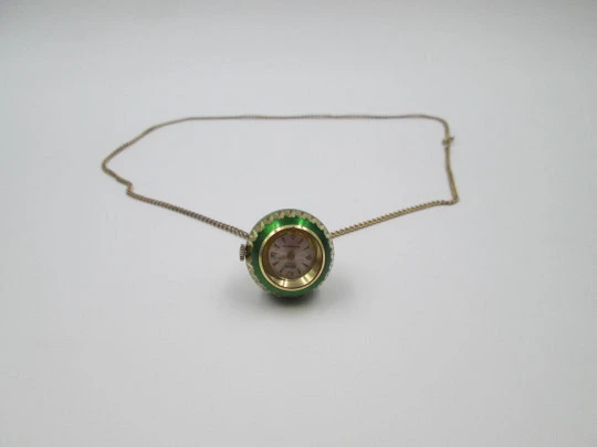 Mortima women's pendant watch. Gold plated and green enamel. Ball shape. 1970's