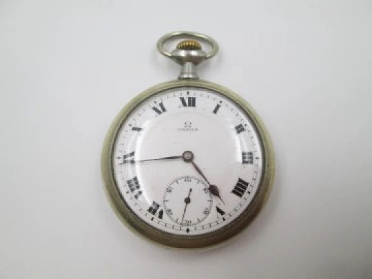 Omega. White metal. Stem-wind. 1920's. Open face. Seconds hand. Swiss