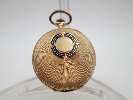 Open-face pocket watch. 14k yellow gold. and blue enamel. Stem-wind. Swiss. 1920's