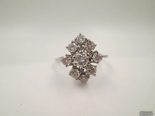 Ring. 18K white gold. 1990. Nine diamonds. Brilliant cut