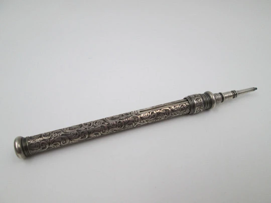 Sampson Mordan mechanical pencil. Silver plated. Black stone. Vegetable motifs. 1890's