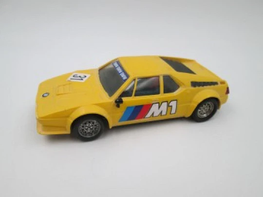 Scalextric slot car. BMW M1. Exin. 1980's. Yellow & black. Spain