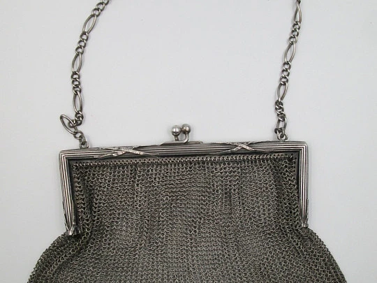 Silver mesh bag. Rectangular clutch frame. Chain. Ball clasp. 1920's