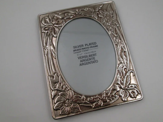 Silver plated brass photo frame. Floral motifs and plant decorations. 1990's. Europe