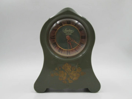 Sonatine musical table clock. Wind-up mechanism. Green bakelite & golden metal