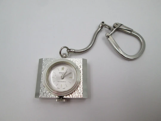 Spendid keychain watch. Silver plated metal. Manual wind. Rectangular case. Swiss. 1980's