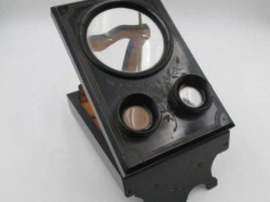 Table / desk stereoscope. Black lacquered wood and brass details. Europe. 1890's