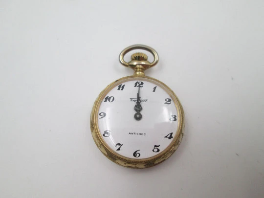 Thermidor women's pendant watch. Gold plated metal. Manual wind. Floral motifs. 1960's