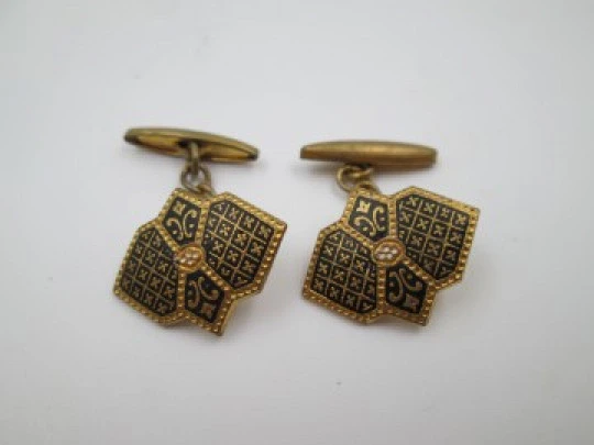 Three men's cufflinks set. Damascene and gold plated. 1970's. Spain