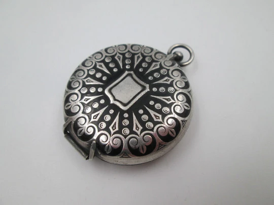 Travel rosary box. Silver plated metal and black enamel. Floral & geometric motifs