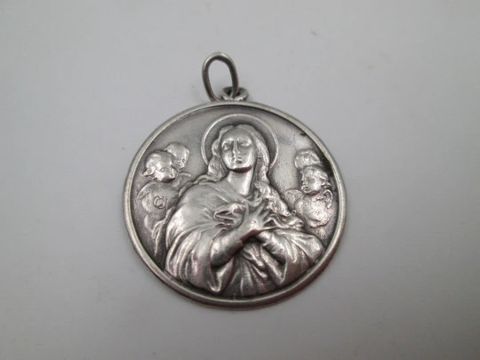 Virgin Mary with cherub busts medal. Sterling silver. Handle and ring. Spain. 1970's