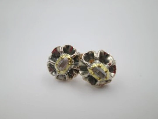 Women's earrings. 18 karat yellow gold and diamond rosettes. 1940's