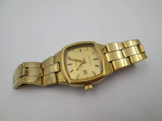 Women's Longines wristwatch. 20 microns gold plated & steel. Automatic. Calendar